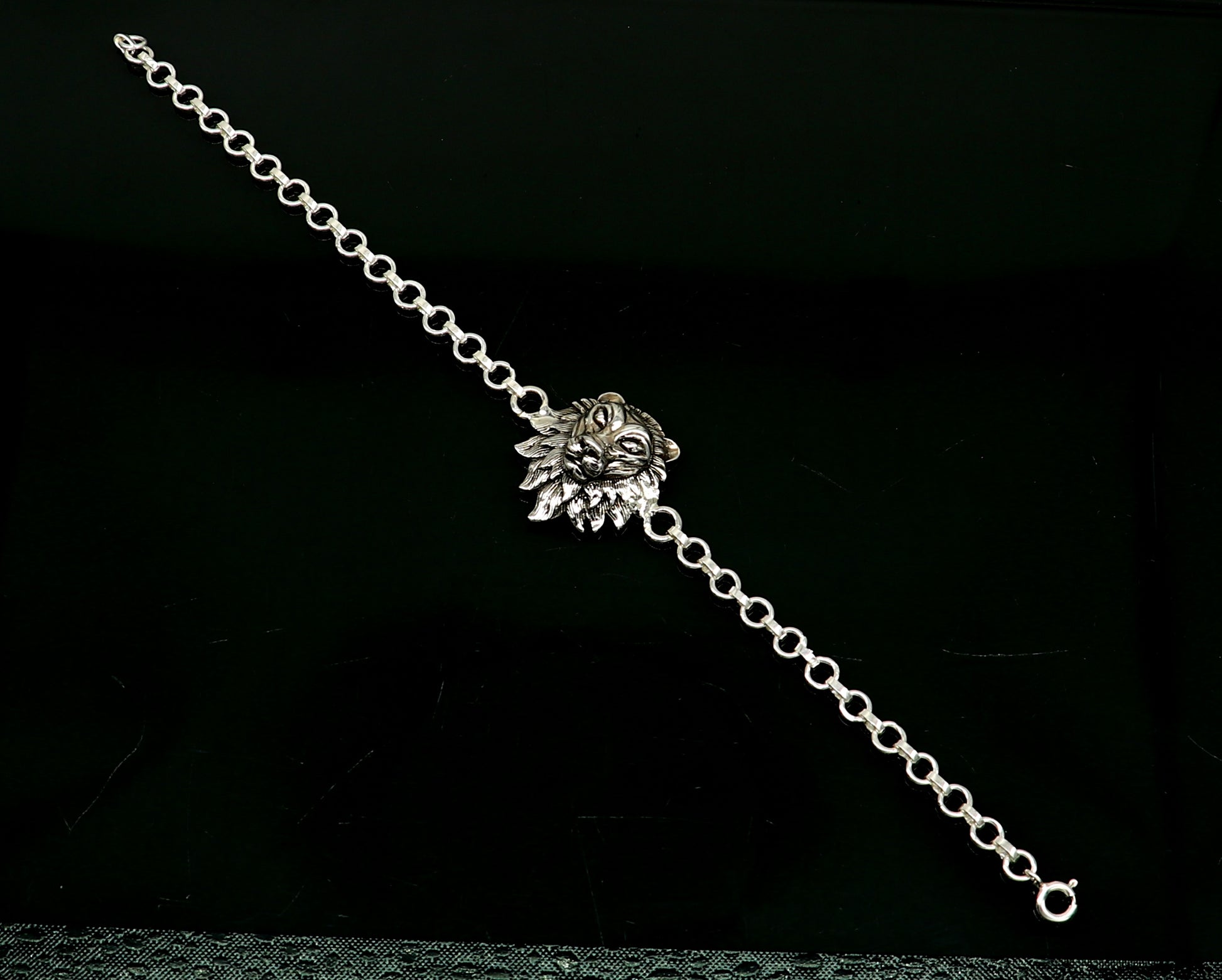 Sterling silver Narsimha lion face bracelet by TRIBAL ORNAMENTS, handcrafted design, available in all sizes, 7-inch length.