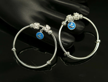 Sterling silver adjustable charm bangle bracelet by Tribal Ornaments, unisex design suitable for kids and babies.