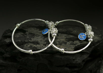 Unisex 925 sterling silver adjustable charm bangle bracelet with intricate tribal designs, suitable for kids and babies.