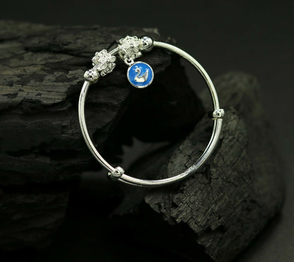925 sterling silver adjustable charm bangle bracelet, unisex kids and baby jewelry, featuring intricate tribal ornament design.