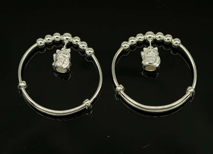 Sterling silver adjustable charm bangle bracelet with tribal design, suitable for kids and unisex wear by Tribal Ornaments.