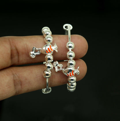 Unisex 925 sterling silver adjustable charm bangle bracelet with intricate tribal designs, suitable for kids and babies.