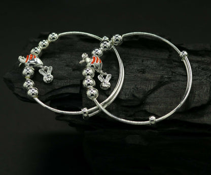 Unisex 925 sterling silver adjustable charm bangle bracelet with tribal design, suitable for kids and babies by Tribal Ornaments.