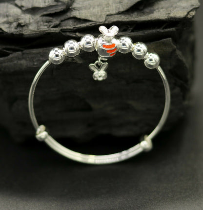 Unisex 925 sterling silver adjustable charm bangle bracelet with intricate tribal design for kids and babies.