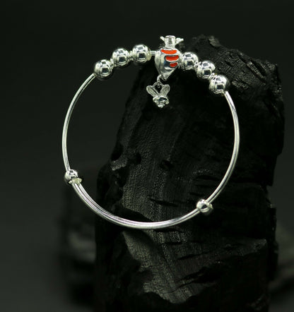 Unisex 925 sterling silver adjustable charm bangle bracelet with intricate tribal design, suitable for kids and babies.
