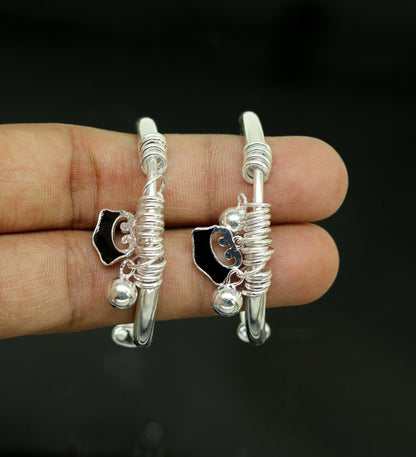 Unisex 925 sterling silver adjustable charm bangle bracelet with tribal design, suitable for kids and babies.