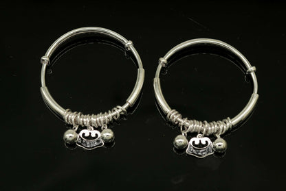 Unisex kids sterling silver adjustable charm bangle bracelet with intricate tribal design, lightweight and suitable for babies and toddlers.