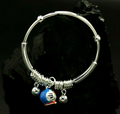 Sterling silver adjustable charm bangle bracelet with tribal design, suitable for kids and unisex wear by TRIBAL ORNAMENTS.