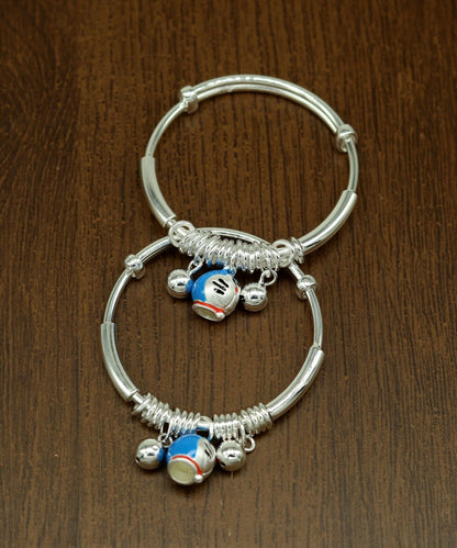 Unisex 925 sterling silver adjustable charm bangle bracelet with tribal ornament design for kids and babies.