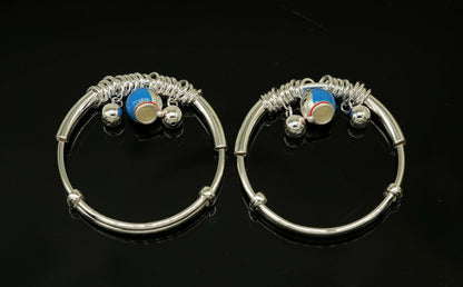 Unisex 925 sterling silver adjustable charm bangle bracelet with tribal design, suitable for kids and babies, by Tribal Ornaments.