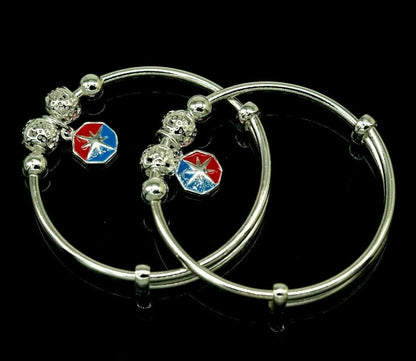 925 sterling silver unisex adjustable charm bangle bracelet with intricate tribal design for kids and babies.