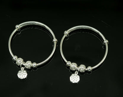 Unisex 925 sterling silver adjustable charm bangle bracelet with intricate tribal design, suitable for kids and babies.