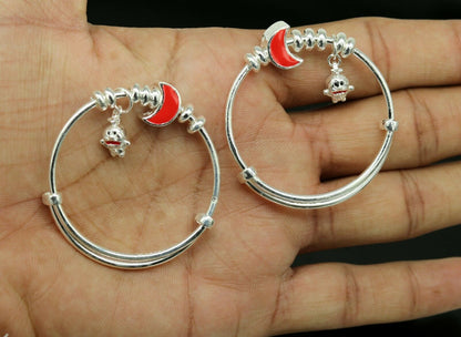 Unisex 925 sterling silver adjustable charm bangle bracelet with intricate tribal ornament design for kids and babies.