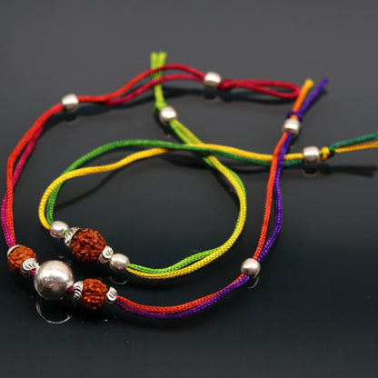925 sterling silver custom design combo 2-piece bracelet with Rudraksha beads, featuring thread and intricate tribal ornament detailing.