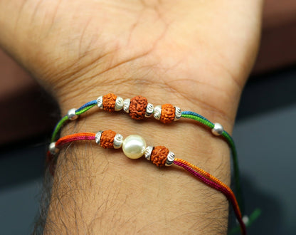 925 sterling silver custom design combo bracelet with Rudraksha beads by TRIBAL ORNAMENTS, featuring two matching thread bracelets.