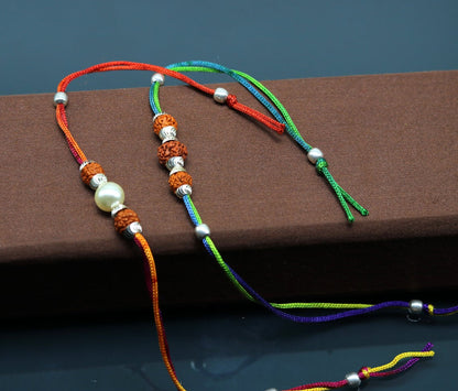 Sterling silver custom design combo 2-piece bracelet with Rudraksha beads, featuring thread detailing and craftsmanship by Tribal Ornaments.