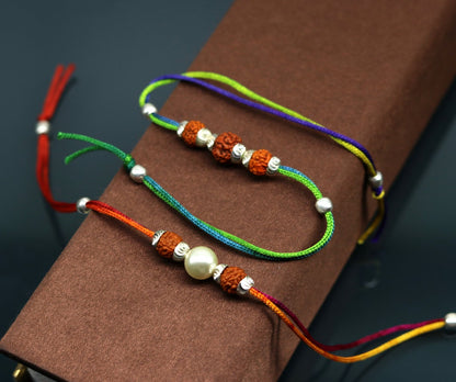 Sterling silver custom design combo bracelet with Rudraksha beads by Tribal Ornaments, featuring intricate thread detailing.