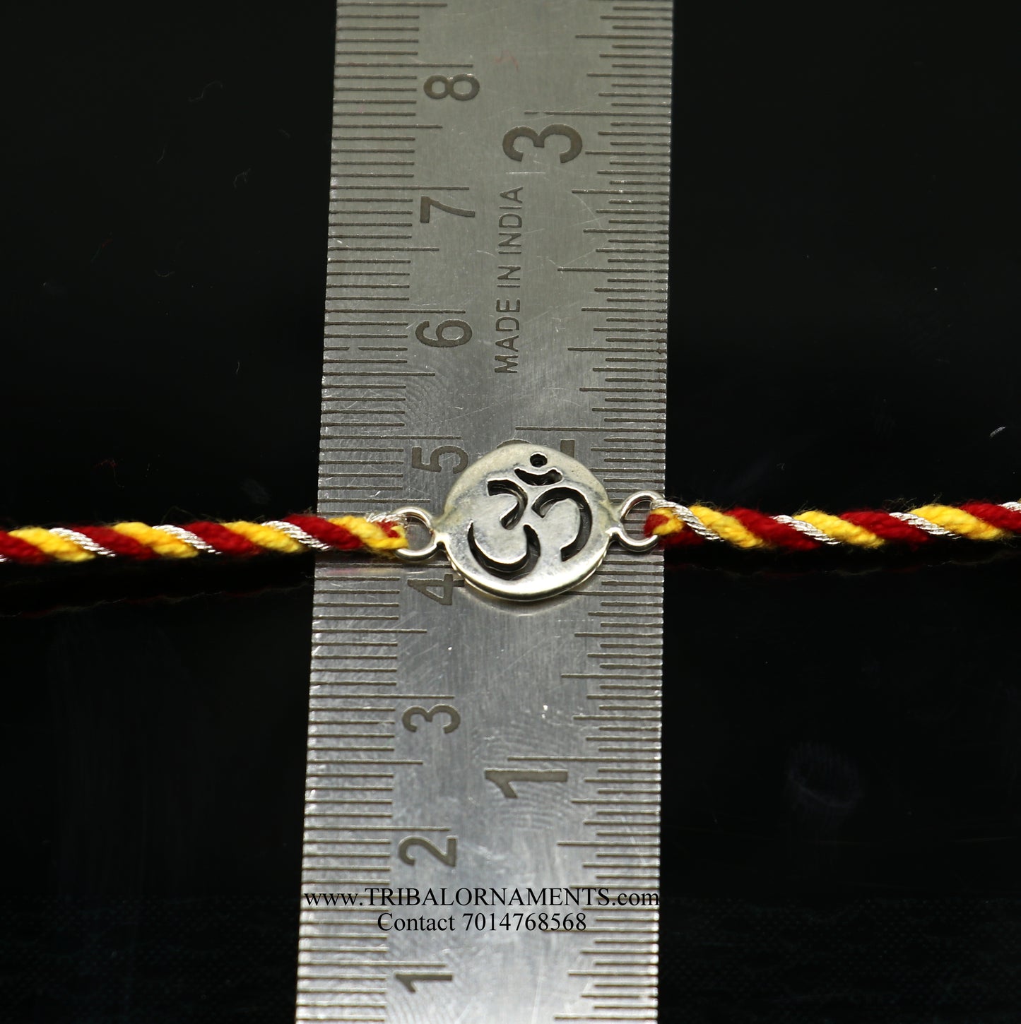 Sterling silver handmade AUM design thread bracelet by TRIBAL ORNAMENTS, featuring intricate tribal-inspired craftsmanship.