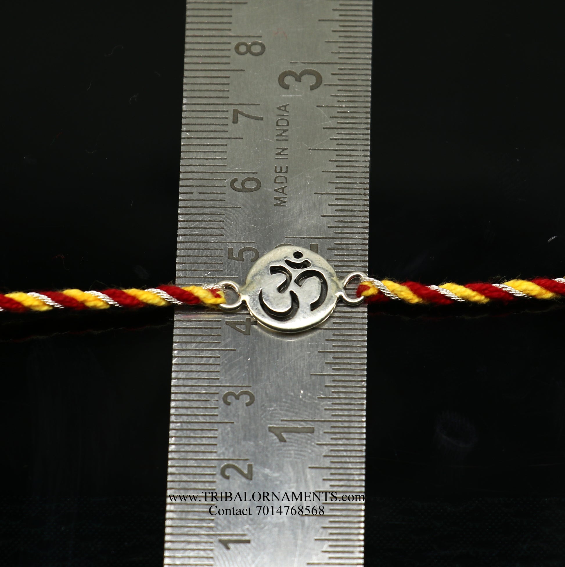 Sterling silver handmade AUM design thread bracelet by TRIBAL ORNAMENTS, featuring intricate tribal-inspired craftsmanship.