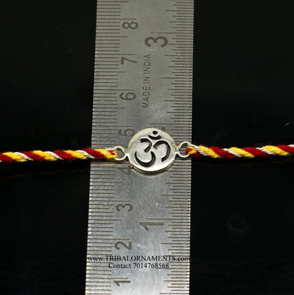 Sterling silver handmade AUM design thread bracelet by TRIBAL ORNAMENTS, featuring intricate tribal-inspired craftsmanship.