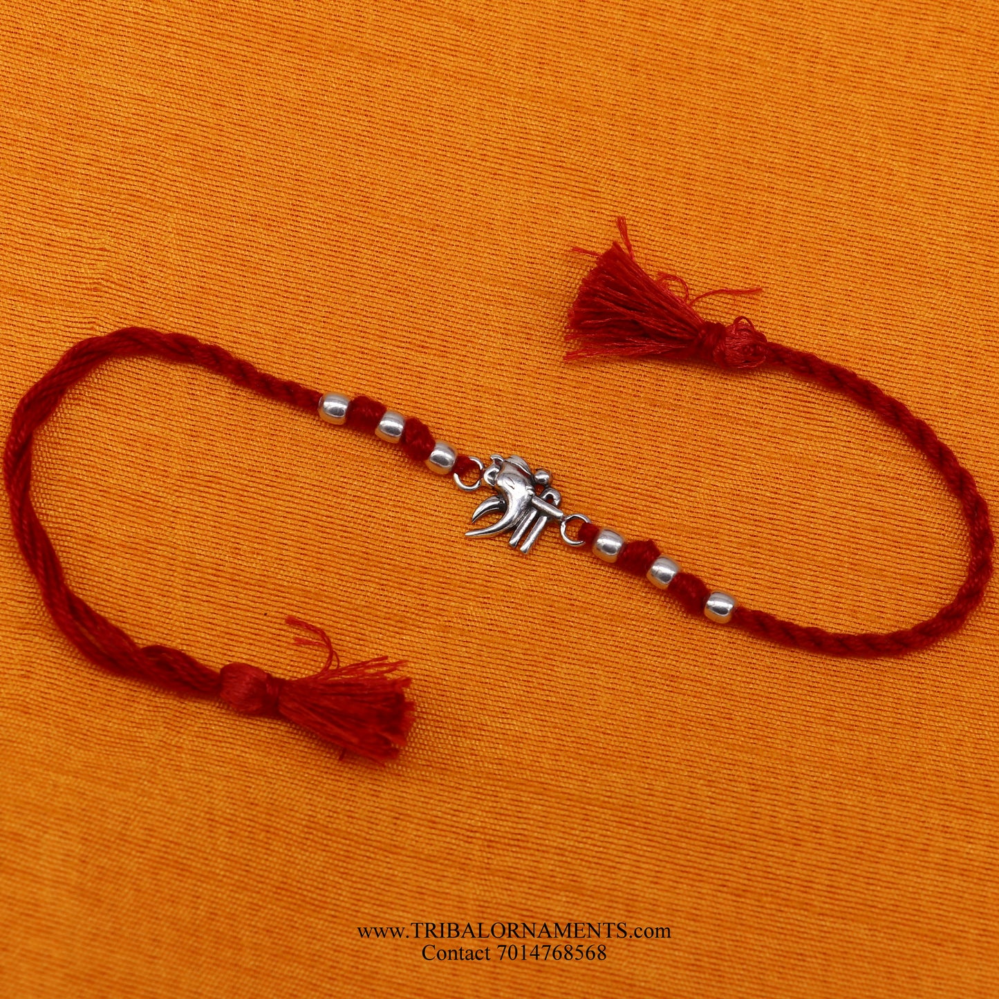 Sterling silver handmade Shree Ganesha design bracelet by TRIBAL ORNAMENTS with intricate detailing, perfect as a stylish gift.
