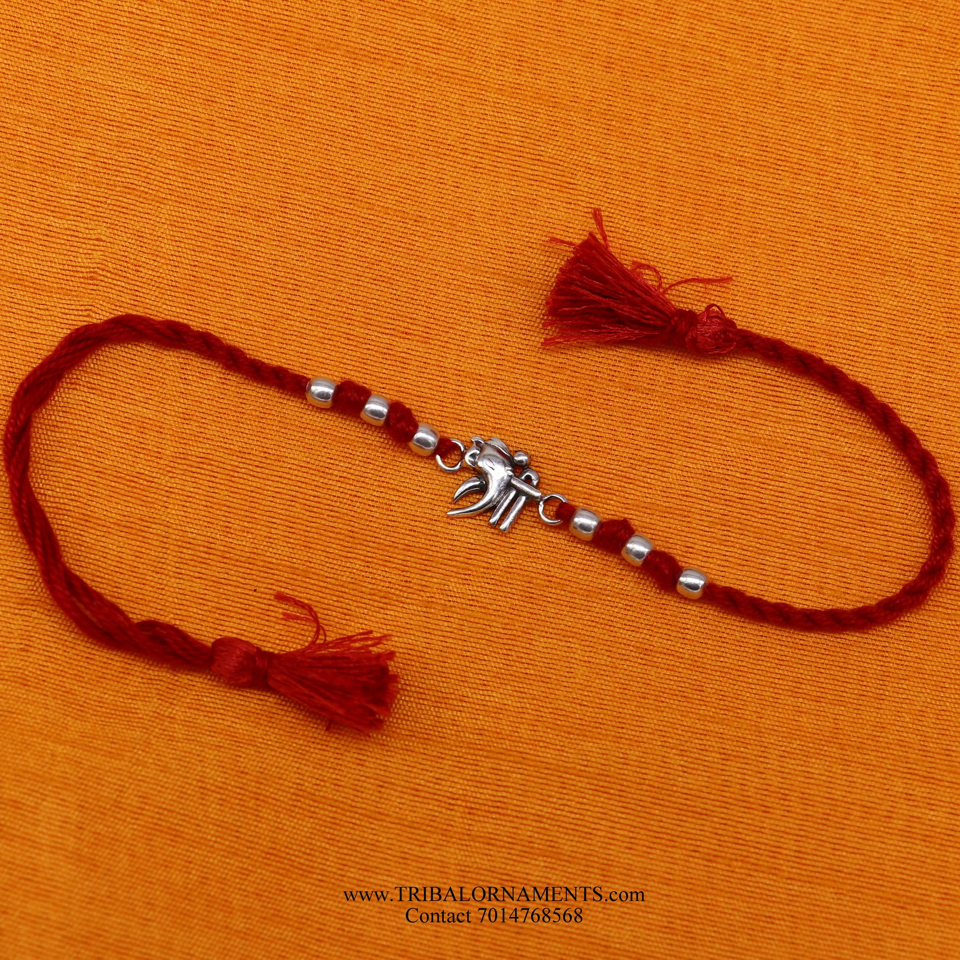 Sterling silver handmade Shree Ganesha design bracelet by TRIBAL ORNAMENTS with intricate detailing, perfect as a stylish gift.