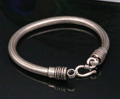 Vintage-style 925 sterling silver snake chain bracelet, unisex, handmade, customized jewelry with intricate design details.