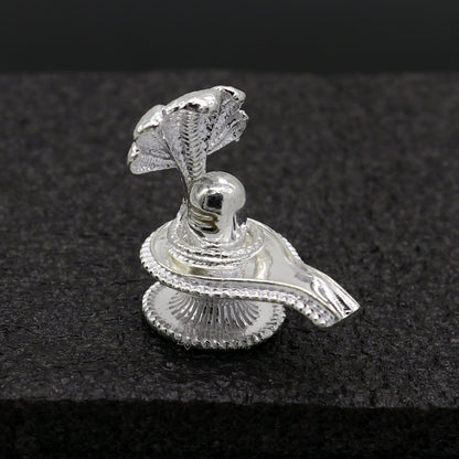 Small handmade 1.2-inch sterling silver Lord Shiva lingam stand by Tribal Ornaments, ideal for puja and prosperity rituals.