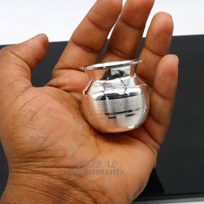 Small 1.5-inch handmade sterling silver Kalash pot for puja, featuring a plain design, used for water or milk offerings in India.