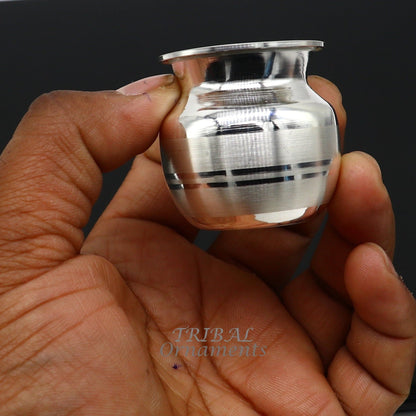 Small 1.5-inch handmade sterling silver Kalash pot for puja, crafted by Tribal Ornaments, used for water or milk offerings in India.