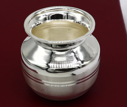 Small 1.5-inch sterling silver handmade Kalash pot for puja, featuring a plain design, used for water or milk offerings in India.