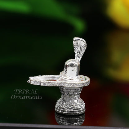 Small 1-inch sterling silver Lord Shiva lingam stand by TRIBAL ORNAMENTS, handcrafted solid silver Shivling for puja and prosperity.