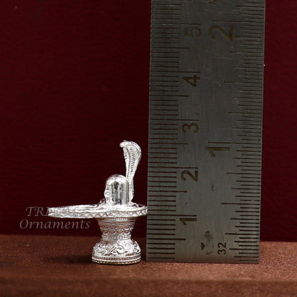 Small 1-inch handmade sterling silver Lord Shiva lingam stand, crafted for puja, symbolizing wealth and prosperity.