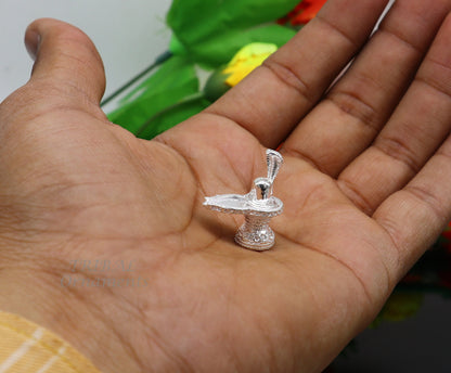 Small 1-inch handmade 925 sterling silver Lord Shiva lingam stand for puja, symbolizing wealth and prosperity, crafted by TRIBAL ORNAMENTS.
