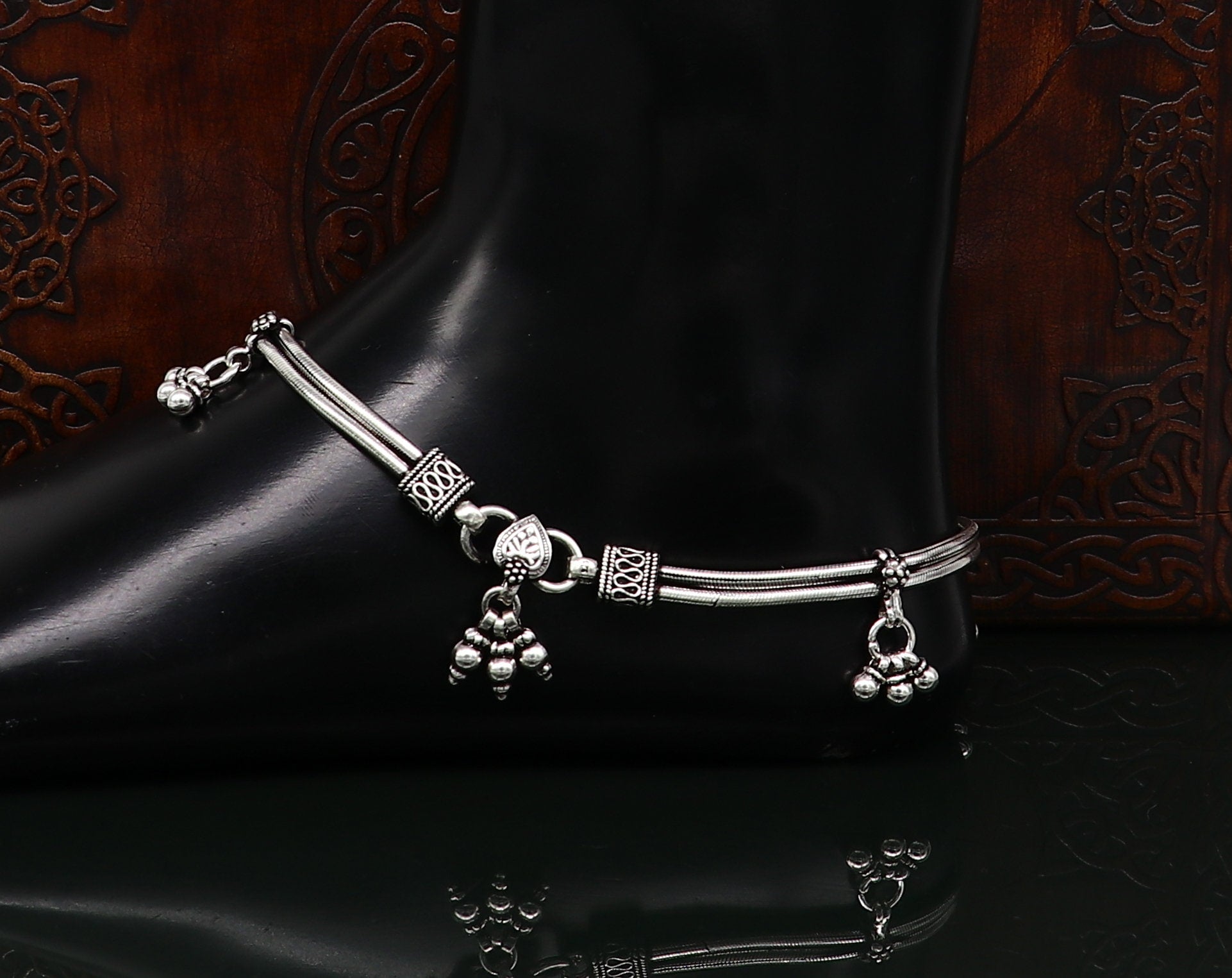 Vintage 10.5-inch sterling silver snake-style anklet with hanging bells, handcrafted tribal foot jewelry with antique design.