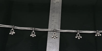 Vintage 10.5-inch sterling silver snake style anklet with hanging bells, handmade tribal ankle bracelet with antique design.
