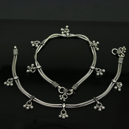 Sterling silver vintage-style 10.5-inch snake chain anklet with hanging bells, crafted by TRIBAL ORNAMENTS for foot jewelry.