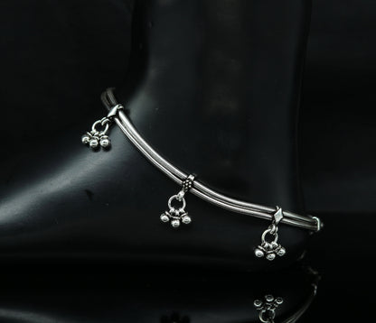 Sterling silver vintage-style snake chain anklet with hanging bells, custom design, tribal-inspired foot jewelry by TRIBAL ORNAMENTS.