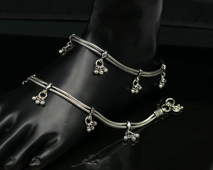 Sterling silver vintage-style snake chain anklet with hanging bells, custom design, tribal-inspired jewelry for ankles and feet