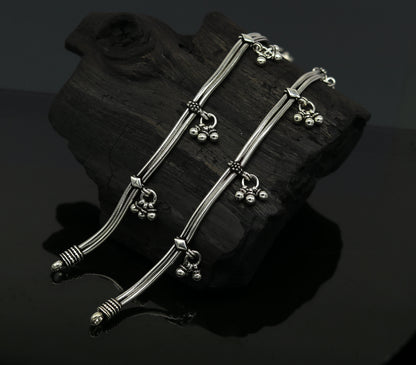 Sterling silver vintage-style snake chain anklet with hanging bells, customized foot jewelry by TRIBAL ORNAMENTS.