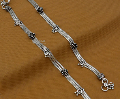 Sterling silver vintage rose flower design 3-string anklet with charming floral charms, featuring intricate craftsmanship and elegant style.