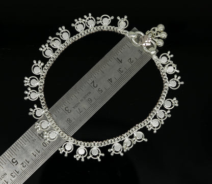Handmade sterling silver ankle bracelet with noisy bells and charms, perfect for belly dance or bohemian style jewelry.
