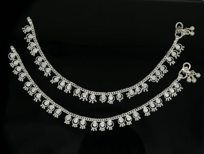 Handmade sterling silver ankle bracelet with noisy bells and charm, perfect for belly dance accessories and custom jewelry.