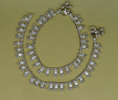 Sterling silver ankle bracelet with noisy bells and charm details, handcrafted tribal jewelry perfect for belly dance and gifting.