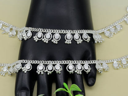 Handmade 10.5-inch sterling silver ankle bracelet with noisy bells, charms, and intricate details, perfect for belly dance jewelry.