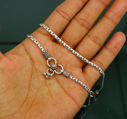 Pair of 10.5-inch handmade sterling silver anklets with lightweight, intricate chain design, trendy foot jewelry by TRIBAL ORNAMENTS.