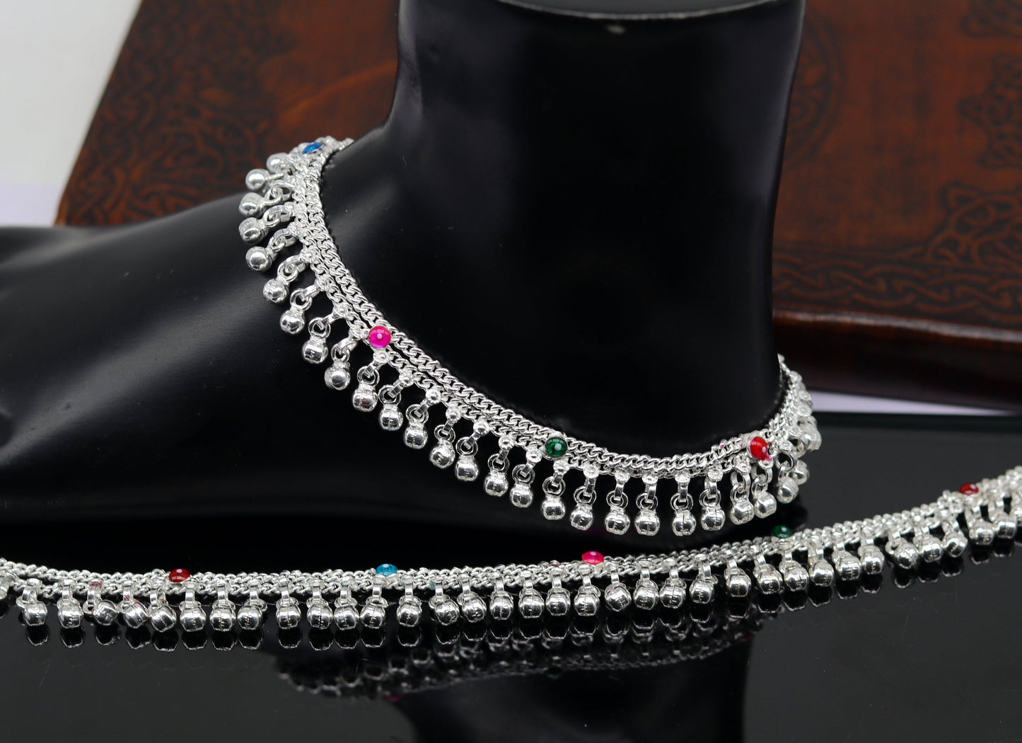 Sterling silver double chain anklet bracelet with jingling charms, ideal for belly dance, featuring customizable design and intricate details.