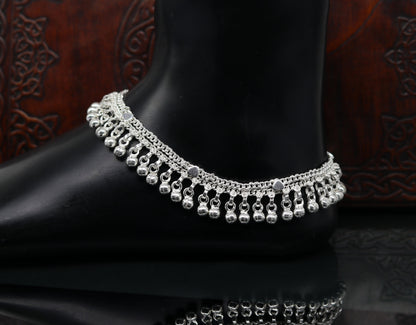 Sterling silver double chain anklet with waved jingle bells and charm, perfect for feet or belly dance jewelry.
