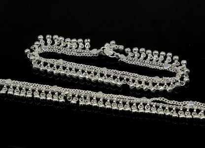 Sterling silver double chain anklet with waved jingle bells and charm, perfect for belly dance jewelry and ankle decoration.