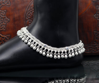 Sterling silver double chain anklet with waved jingle bells and charm, perfect for belly dance jewelry and ankle decoration.